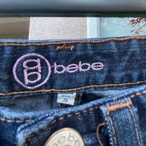 Bebe jeans size 26, stoned back pockets